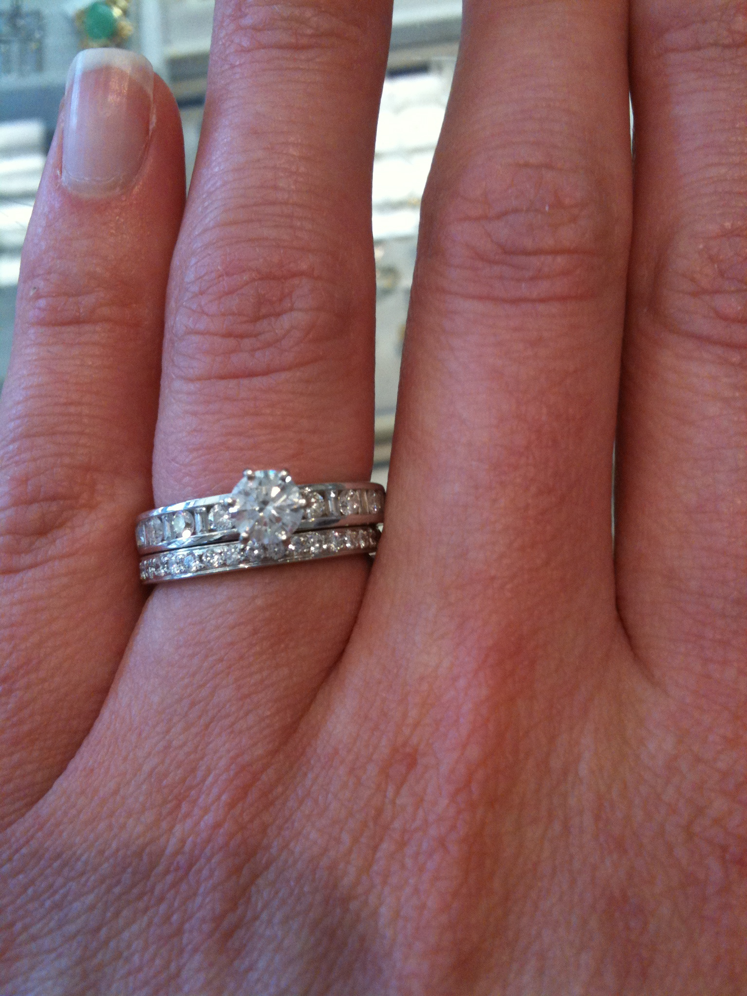 Engagement and wedding ring placement